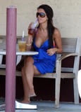 Audrina Patridge shows huge cleavage wearing low-cut blue dress and small bikini in West Hollywood